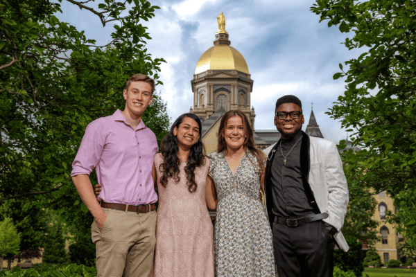 Portrait of Ryan Murphy, Zaneta Raymond, Antonia Bihan, Paul-Mark O. Eroma smiling together
